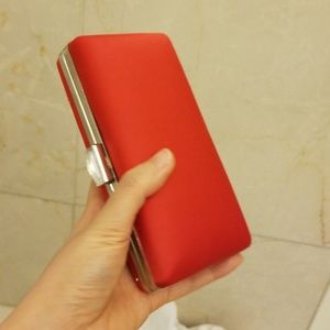 Bright red satin evening clutch